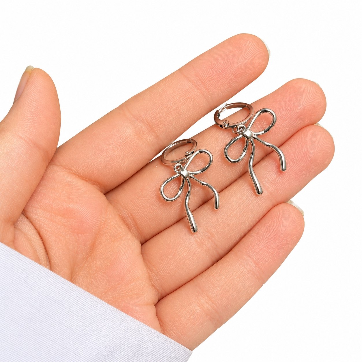 گوشواره زنانه پاپیون رنگ ثابت استیل